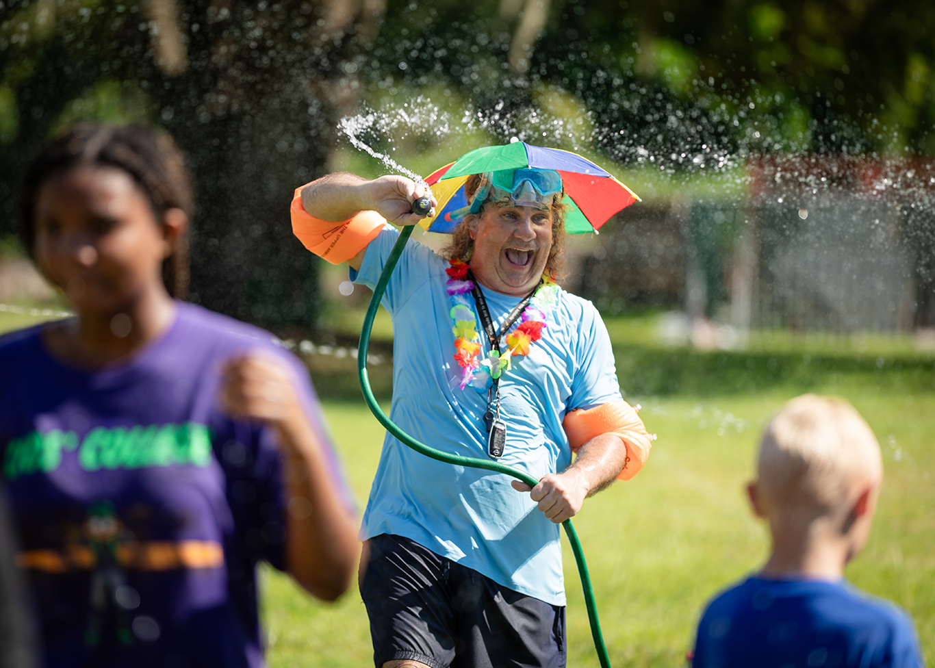 Kids College students playing at field day