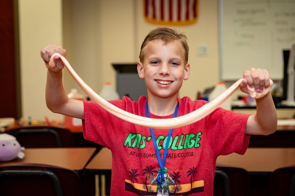 Kids college student playing with slim