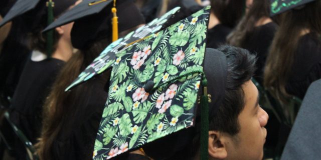 Back of graduation cap with floral decorations