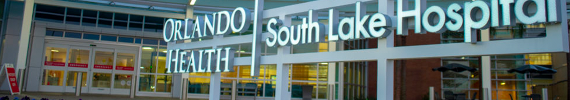 Building in the background with Orlando Health South Lake Hospital letters on a sign in front