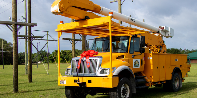 Socially distant but goal oriented: City of Leesburg donates bucket truck to LSSC