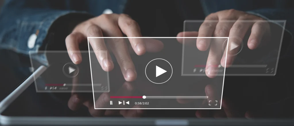 Individual using tablet with video player icons; accessible digital video, multimedia streaming suggested.