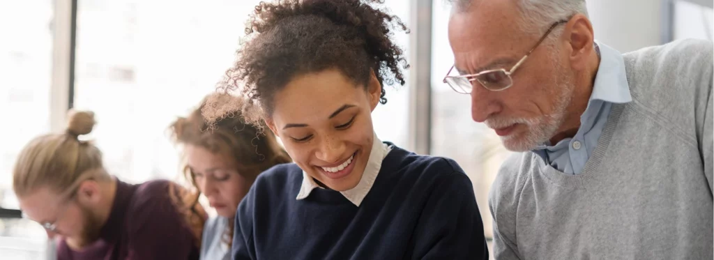 students and a professor engaged in a study session