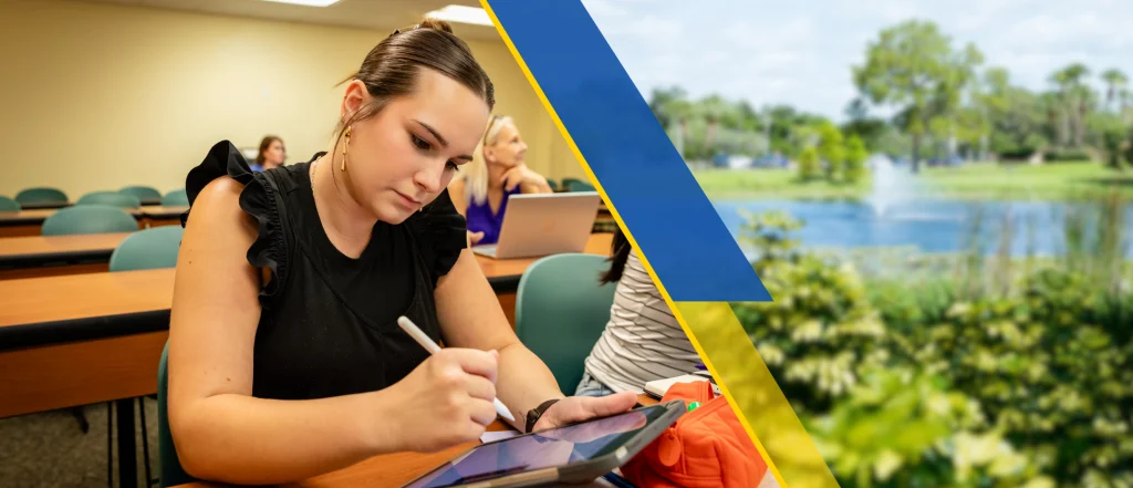 Student looking at tablet while in class