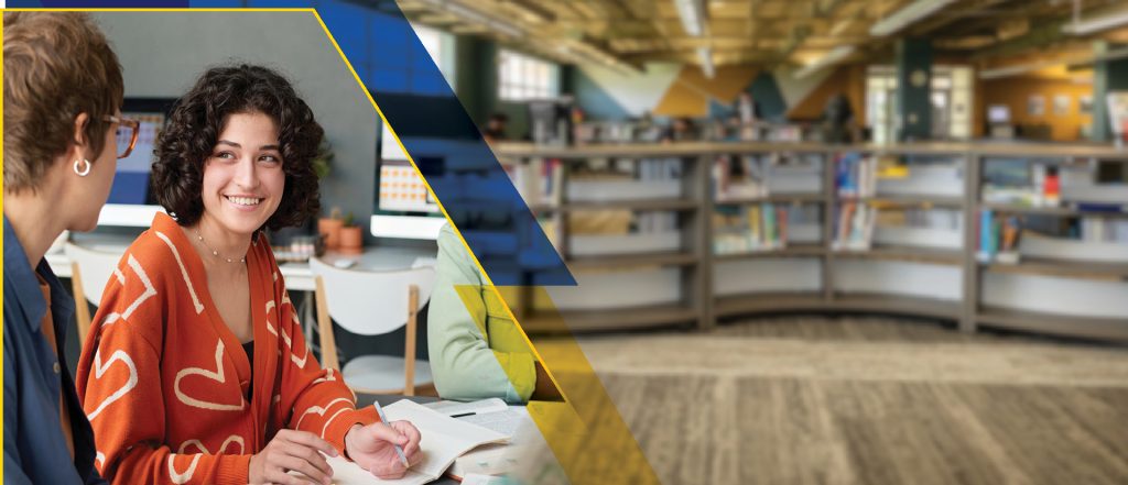 Student and Professor collaborating in modern office setting with laptops