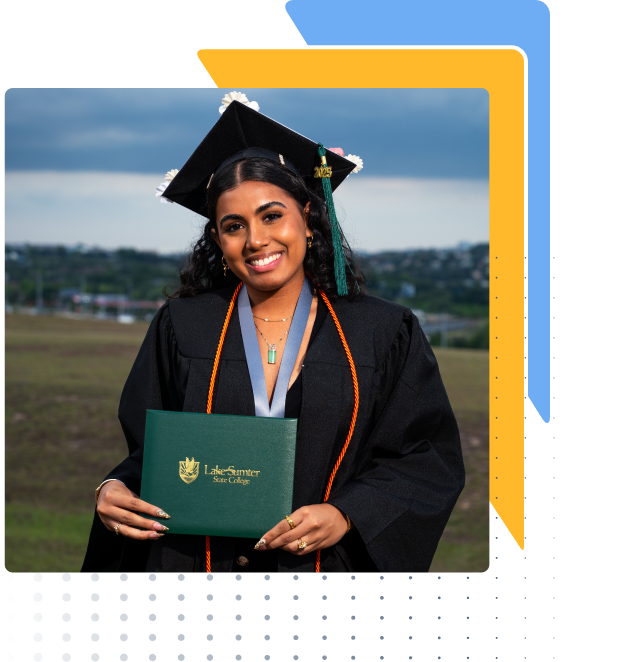 Student in cap and gown holding diploma outdoors, celebrating scholarships; blurred landscape background.
