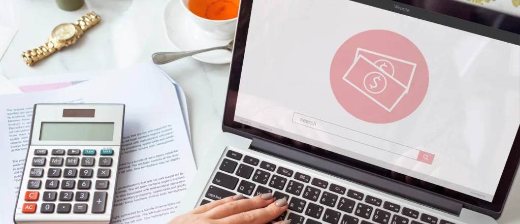 laptop displaying a calculator and a search bar