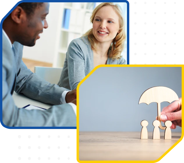 A smiling woman sits across from a man in a business suit, with a wooden umbrella nearby.