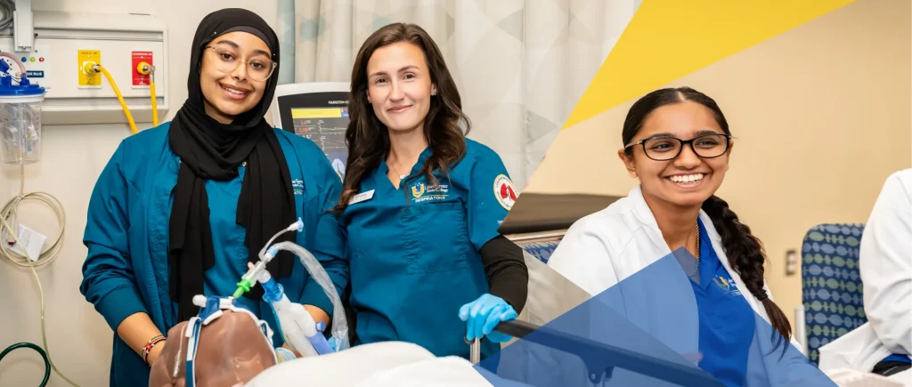 2 nursing students smiling together for a photo