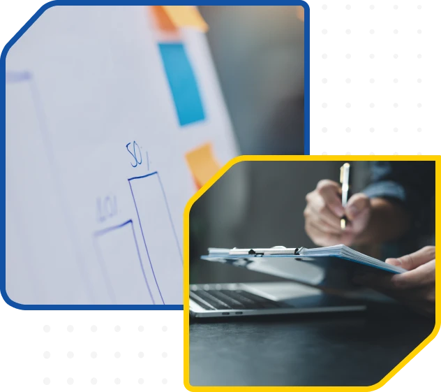 Whiteboard with bar graph and person writing on clipboard near laptop