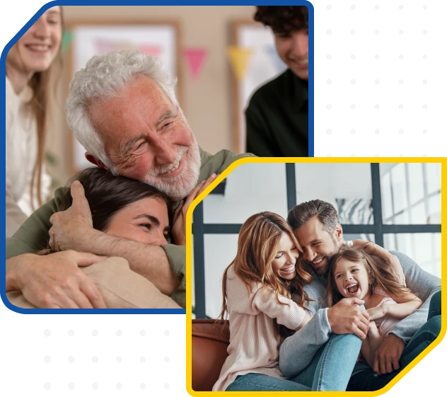 Older man embraces smiling woman and child.