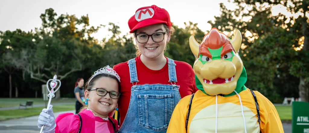 Monster dash participants dressed as Princess, Mario and Bowser characters